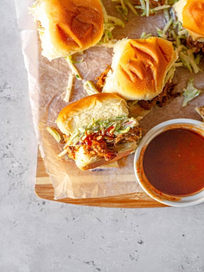 sliders on a wooden tray