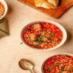 white bowls filled with meatball soup
