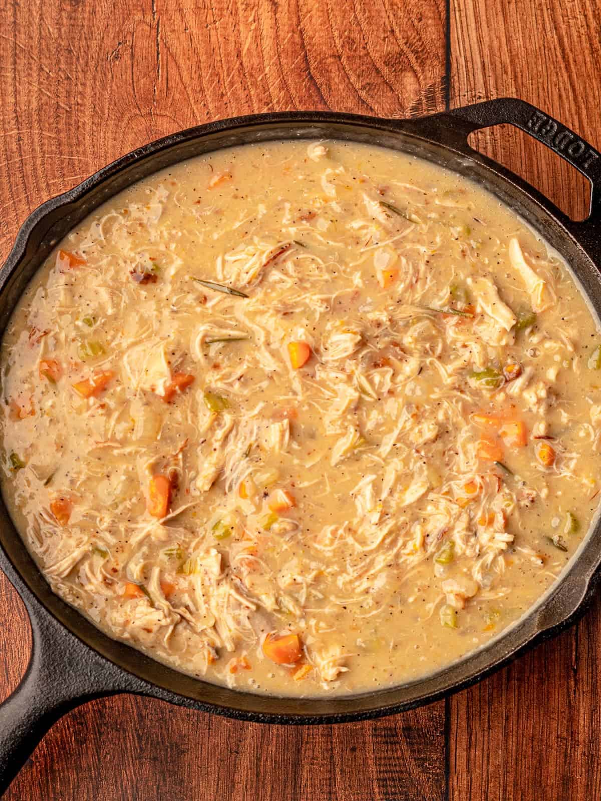 Turkey pot pie filling in a pan.