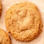 A cookie topped with cinnamon sugar.