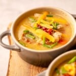 Bowl of chicken and potato soup.
