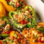 Stuffed peppers in a baking dish.