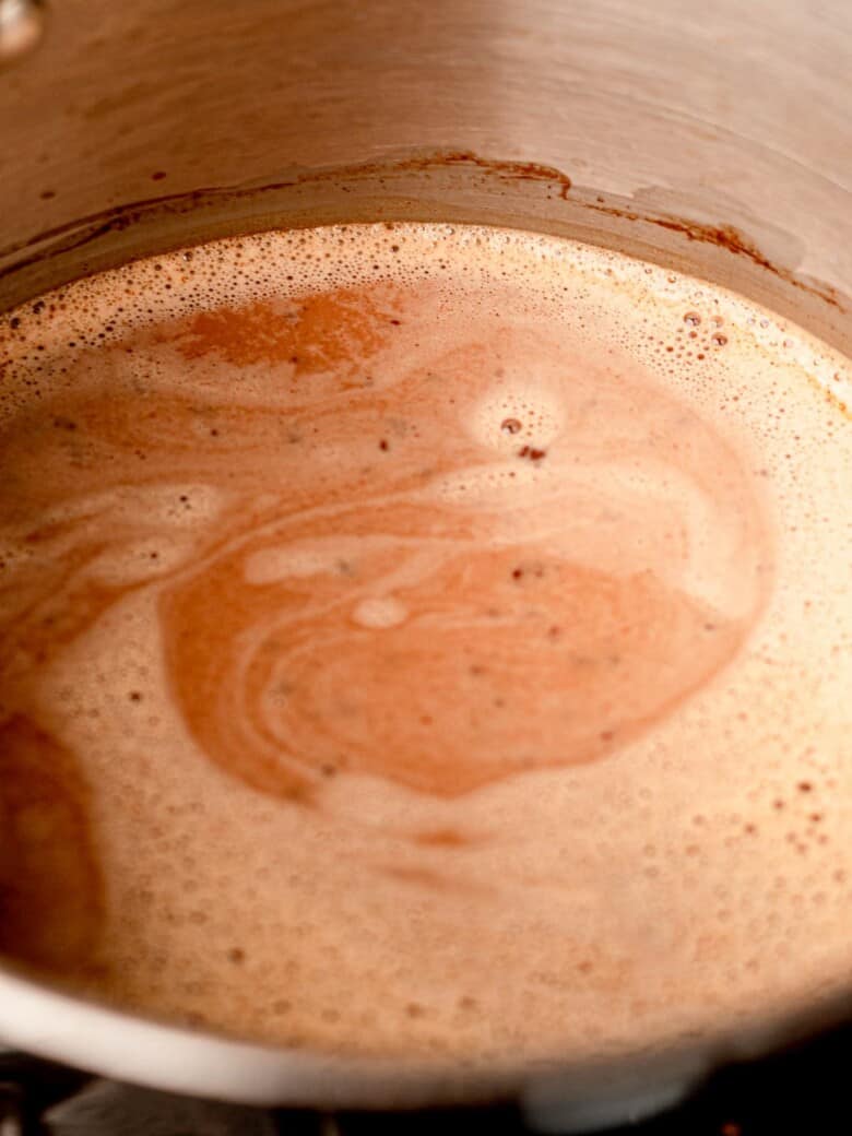 Hot chocolate in a saucepan.