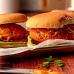 Salmon patties on buns.
