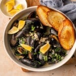 Garlic butter mussels in a bowl.