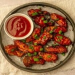 A tray of bbq chicken wings.