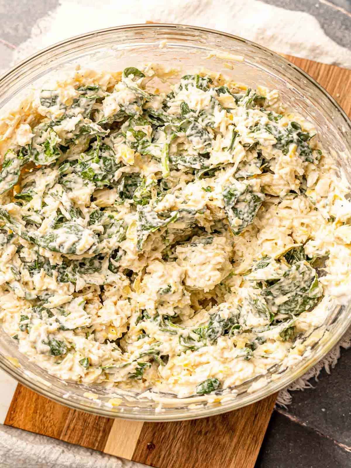 Crab spinach dip in a bowl.