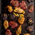Smashed potatoes on a sheet pan.