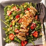 Chicken and strawberry salad on a platter.