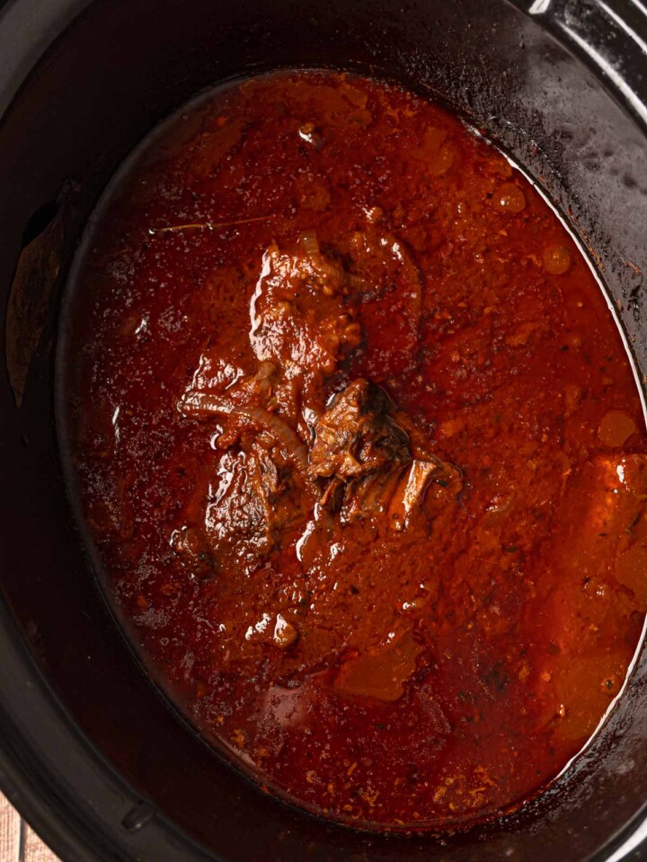 Italian pot roast cooked until tender in a slow cooker with thick tomato gravy.