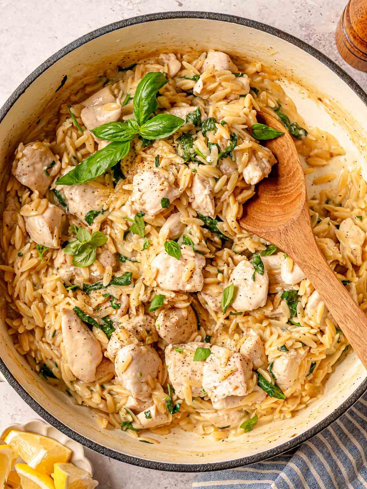 Creamy chicken orzo with spinach, parmesan, lemon, and tender chicken.